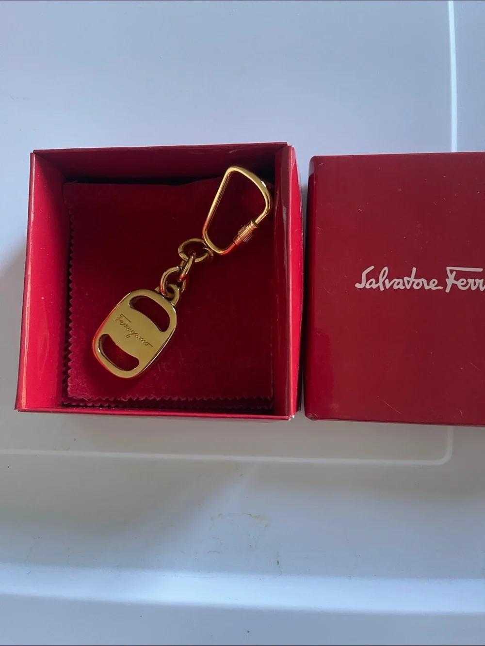 New in box Salvatore Ferragamo Gold-tone Key & Card Holder Charm
